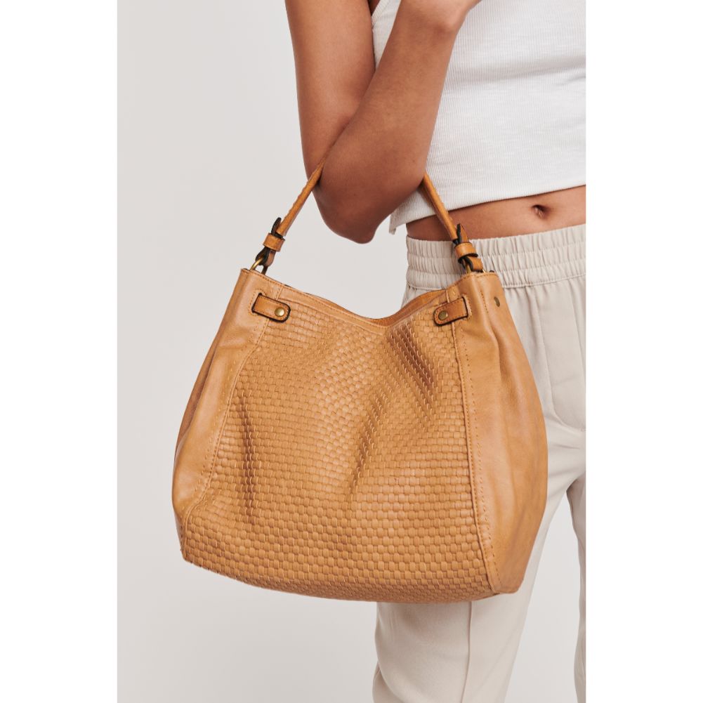 Woman wearing Tan Moda Luxe Raven Hobo 842017120711 View 1 | Tan