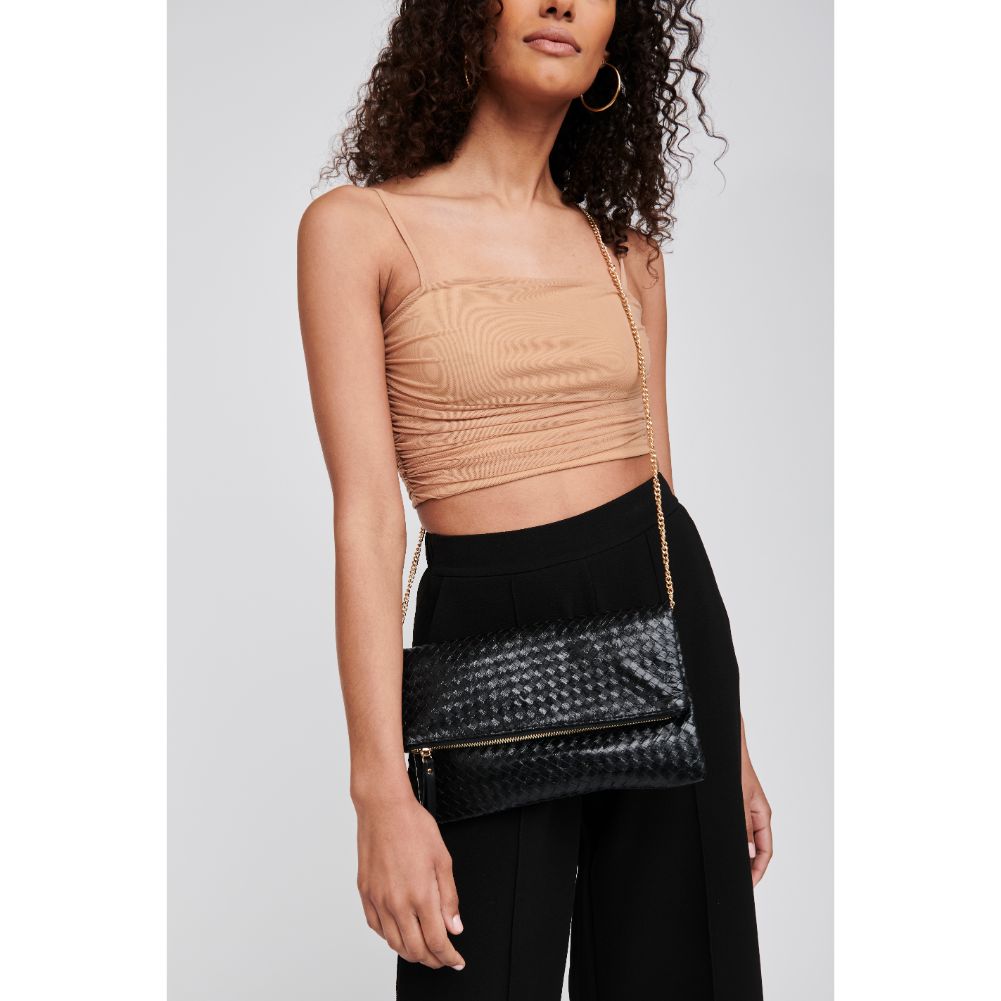 Woman wearing Black Moda Luxe Alicia Woven Clutch 842017118053 View 4 | Black