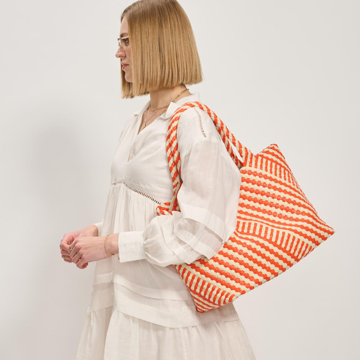 Woman wearing Orange Ivory Moda Luxe Solana - Mixed Material Tote 842017138600 View 2 | Orange Ivory