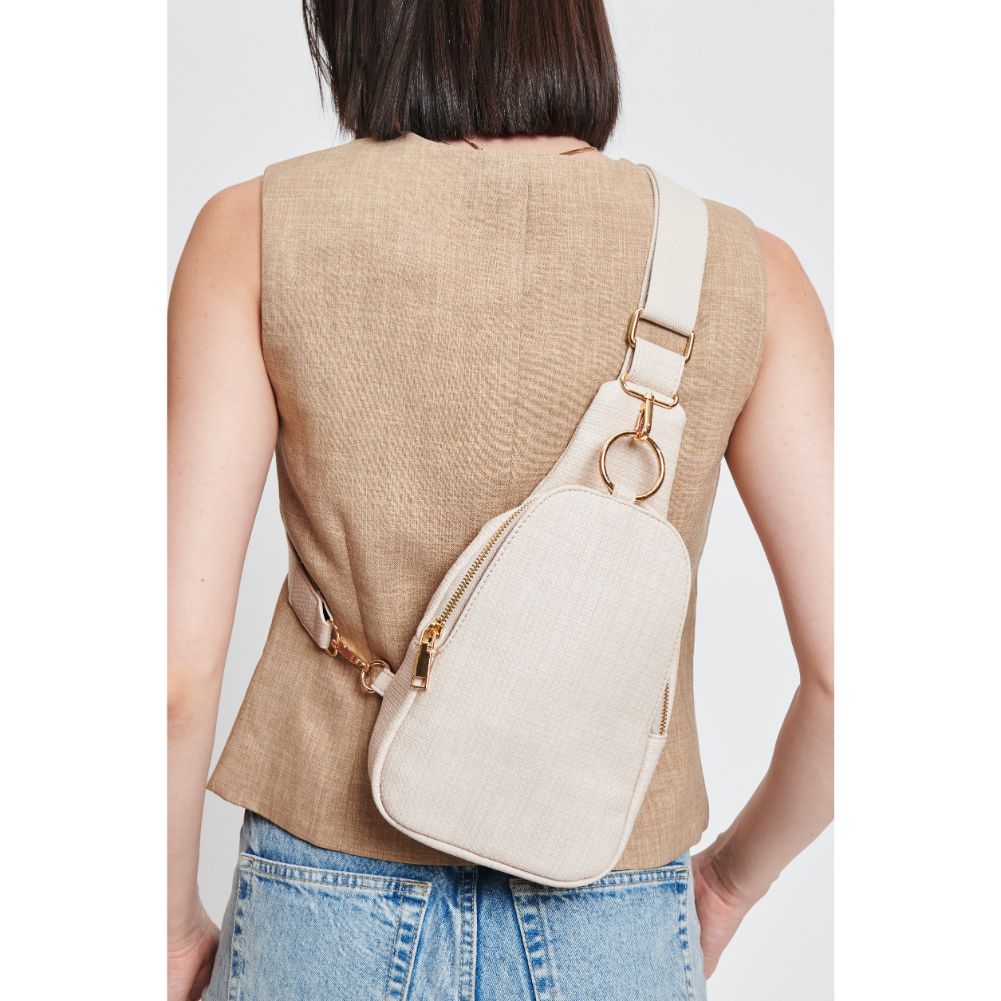 Woman wearing Bone Moda Luxe Regina - Coated Canvas Sling Backpack 842017132615 View 4 | Bone