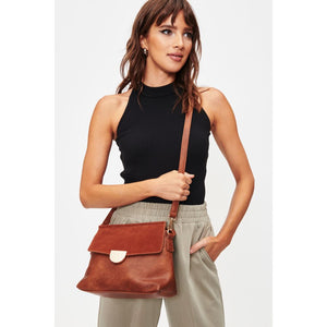 Woman wearing Cognac Moda Luxe Abby Crossbody 842017128625 View 2 | Cognac