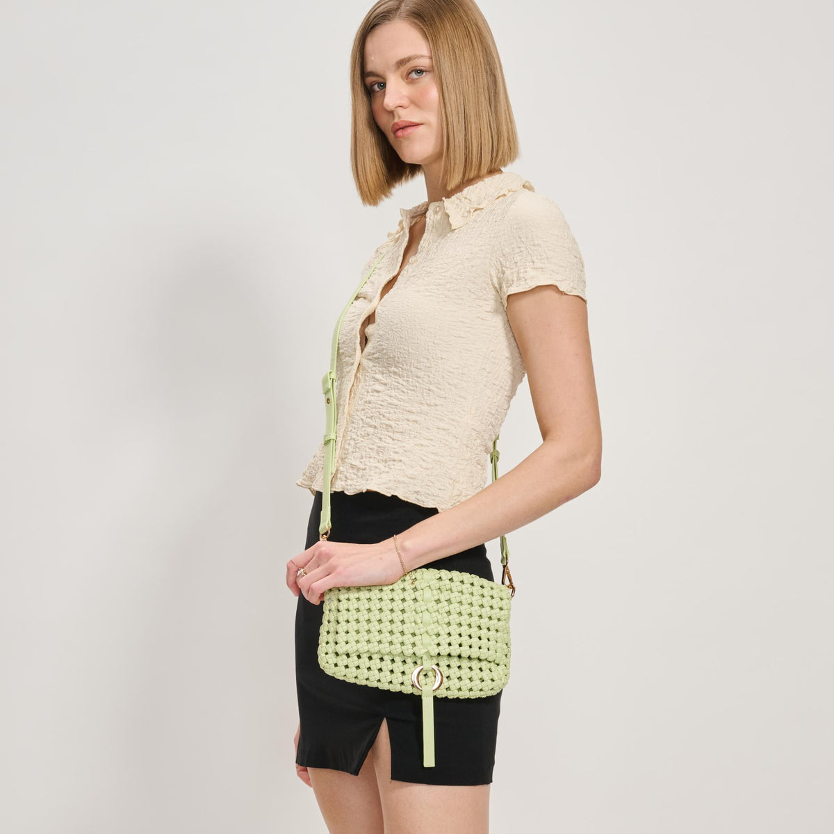 Woman wearing Pistachio Moda Luxe Camilla Crossbody 842017137610 View 1 | Pistachio