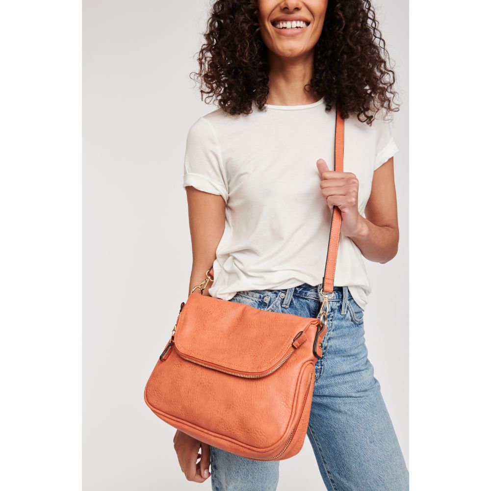 Woman wearing Salmon Moda Luxe Dandelion Crossbody 842017107125 View 4 | Salmon