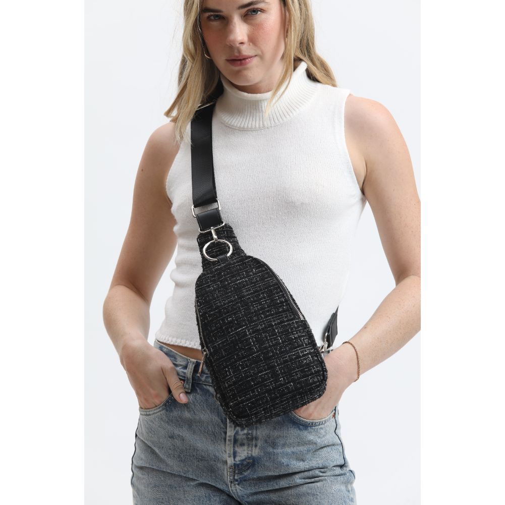 Woman wearing Black Moda Luxe Regina Sling Backpack 842017133360 View 1 | Black