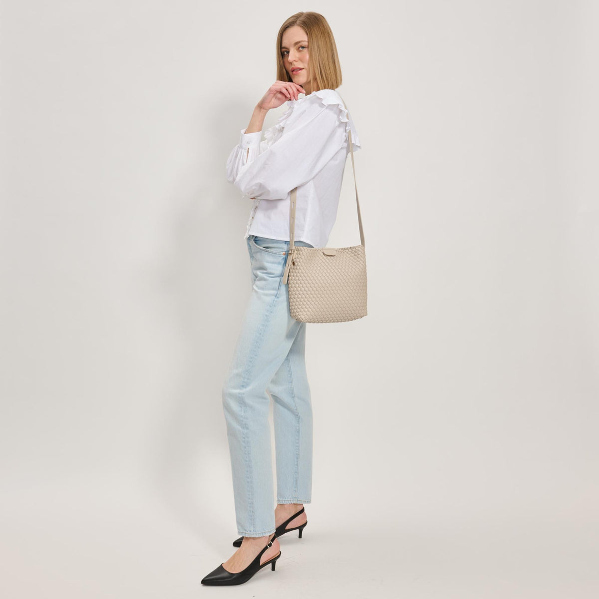 Woman wearing Ivory Moda Luxe Isadora Bucket 842017137337 View 3 | Ivory